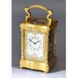 A Late 19th Century French Gilt Brass Carriage Clock No. 7549, the cream enamel dial with black