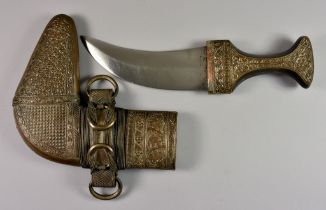 A 20th Century North African Jambya Dagger, with silvered copper metal sheath and hilt, 11.25ins