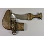 A 20th Century North African Jambya Dagger, with silvered copper metal sheath and hilt, 11.25ins