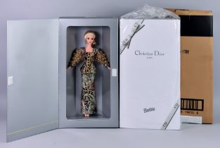 Two Mattel Barbie Dolls, both Christian Dior, a 1995, Serial No. 13168 and a 1996, Serial No. 16013,