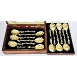 A Set of Twelve Mid-19th Century Continental Cast Parcel Gilt Silver Serving Spoons, stamped with