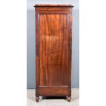 A 19th Century Mahogany Cabinet, with raised top and angled cornice, fitted eight leather fronted