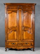 A Late 19th Century French Provincial Oak Armoire, with moulded cornice, plain frieze, fitted two