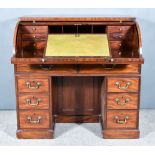 A George III Mahogany Roll Top Desk with square edge and cross-banding to top, the roll-top