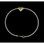 An 18ct Yellow and White Gold Rope Twist Bangle with heart, 180mm overall, gross weight 5.3g The