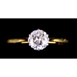 An 18ct Gold Solitaire Diamond Ring, set with a brilliant cut white diamond, approximately .75ct,