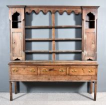 A Late 18th Century Oak Dresser Base, with moulded edge to top, fitted three frieze drawers, on