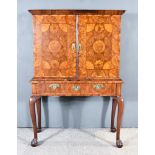 A William and Mary Laburnum Oysterwood Veneered Cabinet, the whole veneered in segmented circular,