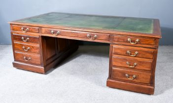 An Early Victorian Mahogany Partners Desk of large proportions, with green leather and gilt tooled