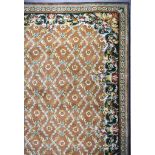 A 20th Century Indian Carpet of Aubusson Design, woven in colours of pale blue, rose and fawn, the