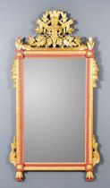 A Red Painted and Parcel Gilt Framed Rectangular Wall Mirror, surmounted by a quiver of arrows and