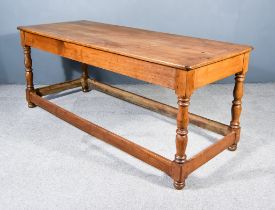 A Late 18th/Early 19th Century Pitch Pine Refectory Kitchen Table, with six plank cleated top, and
