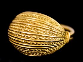 A Danish 18ct Gold Ring by Georg Jensen, stamped 863B, the domed face with rope and reed pattern