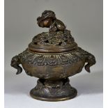 A Chinese Two-Handled Bronze Censer and Cover, 20th Century, the body moulded with birds in flight