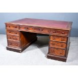 A Victorian Mahogany Partners Desk, with maroon leather and gilt tooled inset and moulded edge to