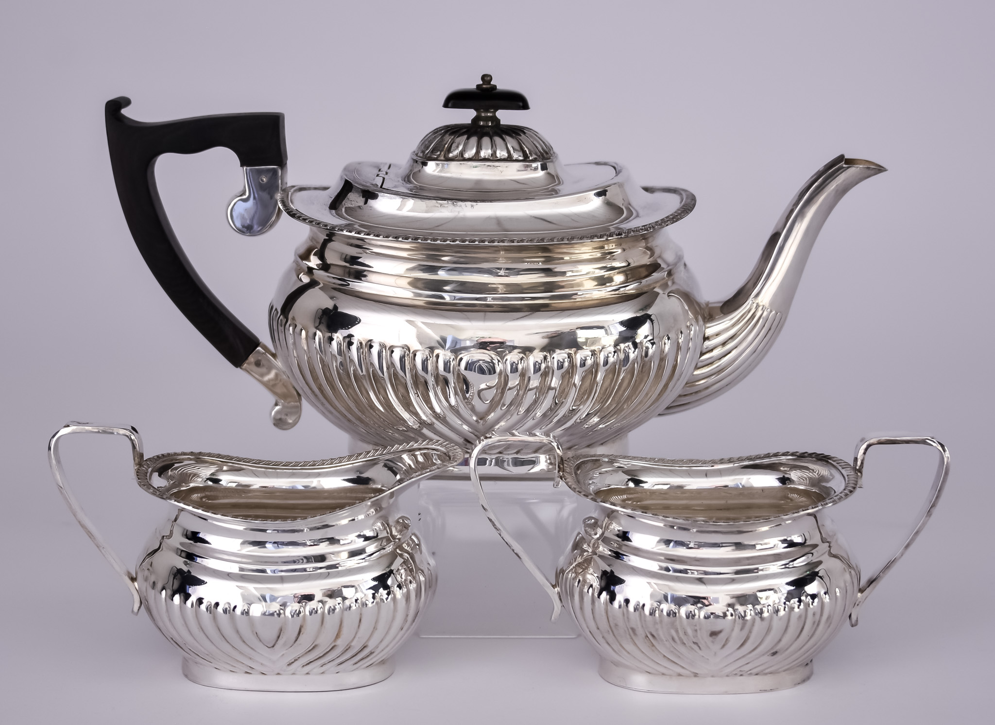 An Elizabeth II Silver Rectangular Three-piece Tea Service, by Viner's Ltd, Sheffield 1963, of