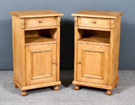 A Pair of Pine Bedside Cabinets, each with square edge to top, fitted one frieze drawer, flanked