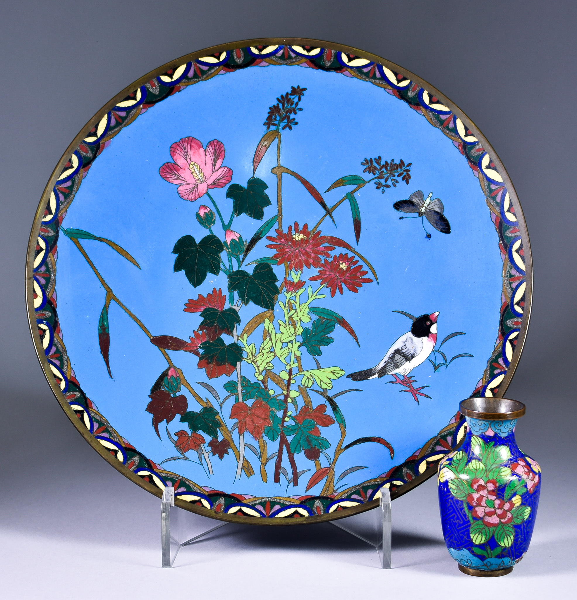 A Japanese Cloisonne Enamelled Circular Dish, 20th Century, decorated with a bird and moth among