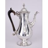 A George III Silver Baluster-Shaped Coffee Pot, by Thomas Chawner, London 1785, with bead mounts,