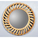 A 20th Century Gilt Wood Carved Circular Wall Mirror, with bold spiral turned frame, inset with