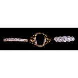 Three Gem Set Rings, comprising - 18ct gold set with five small diamonds, size N+, gross weight 2.