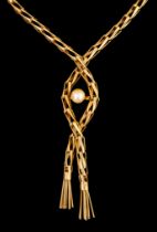 A Yellow Metal Open Link Crossover Necklace, with a centre set cultured pearl and tassled ends,