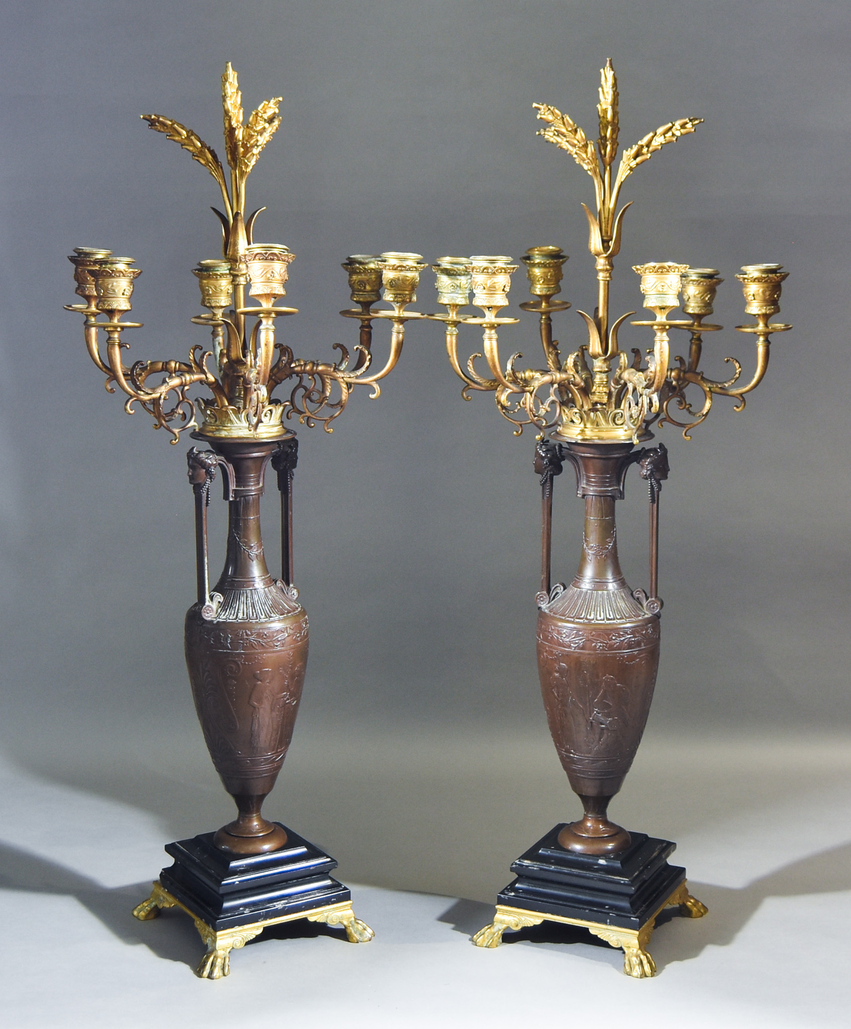 Henry Cahieux (1825-1854) - Pair of brown patinated bronze and ormolu mounted six branch candelabra,