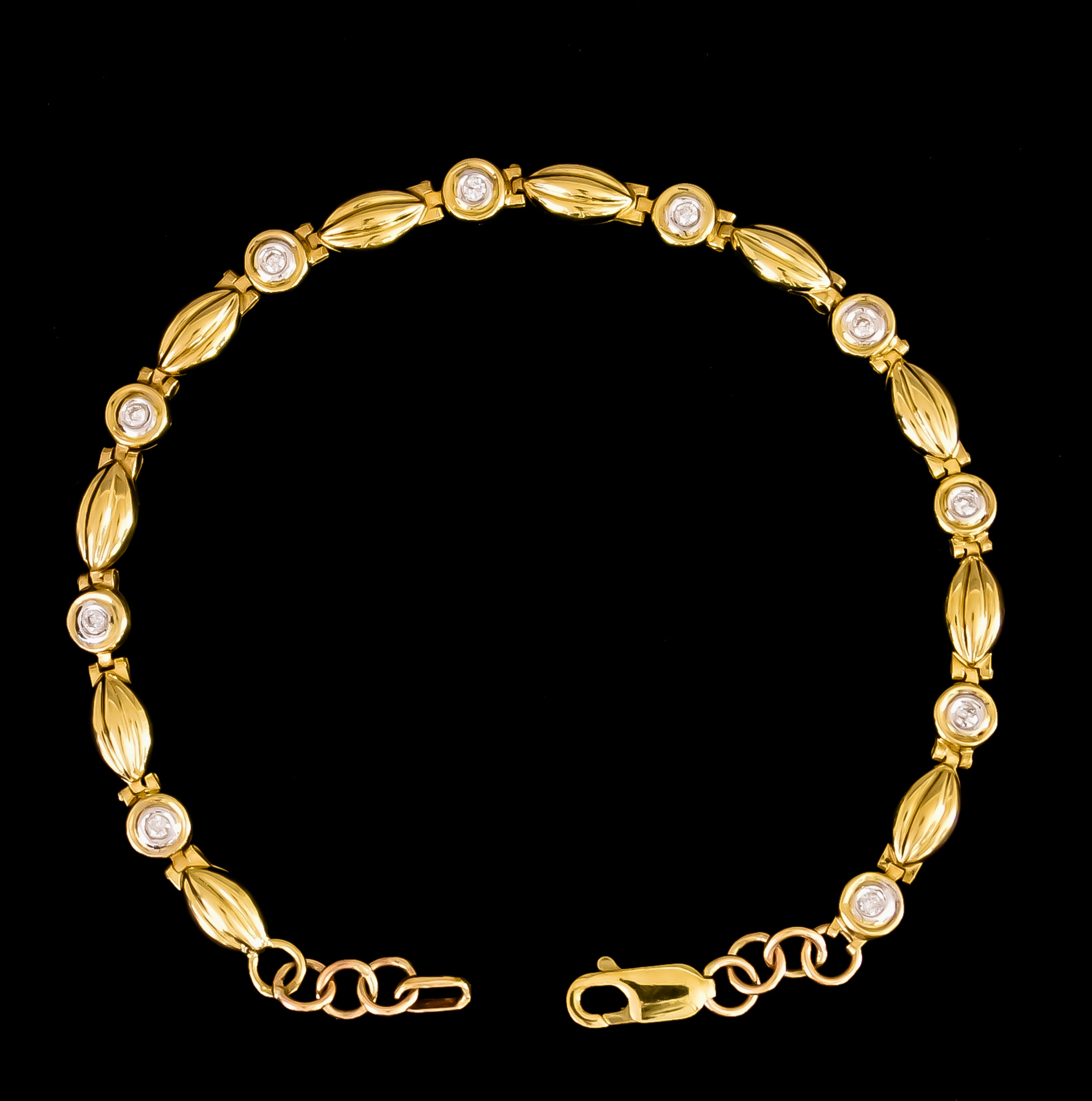 A 9ct Gold Diamond Set Bracelet, set with ten brilliant cut white diamonds, approximately 1ct total,