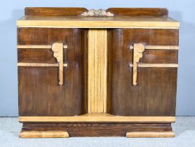 An Early 20th Century Cabinet of "Art Deco" Design, with square edge to top, each cupboard fitted