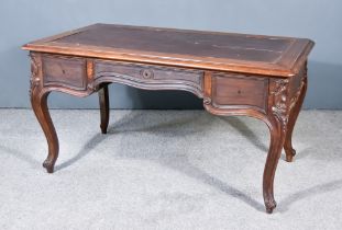 A 19th Century French Fruitwood Writing Desk, with leather inset and moulded edge to top, fitted