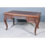 A 19th Century French Fruitwood Writing Desk, with leather inset and moulded edge to top, fitted