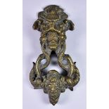 An Italian Bronze Door Knocker, 19th Century, after a 17th century model, cast with a bearded head