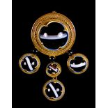 A Victorian Brooch/ Pendant at will, set with cabochon banded agate stone, 52mm x 36mm, gross weight