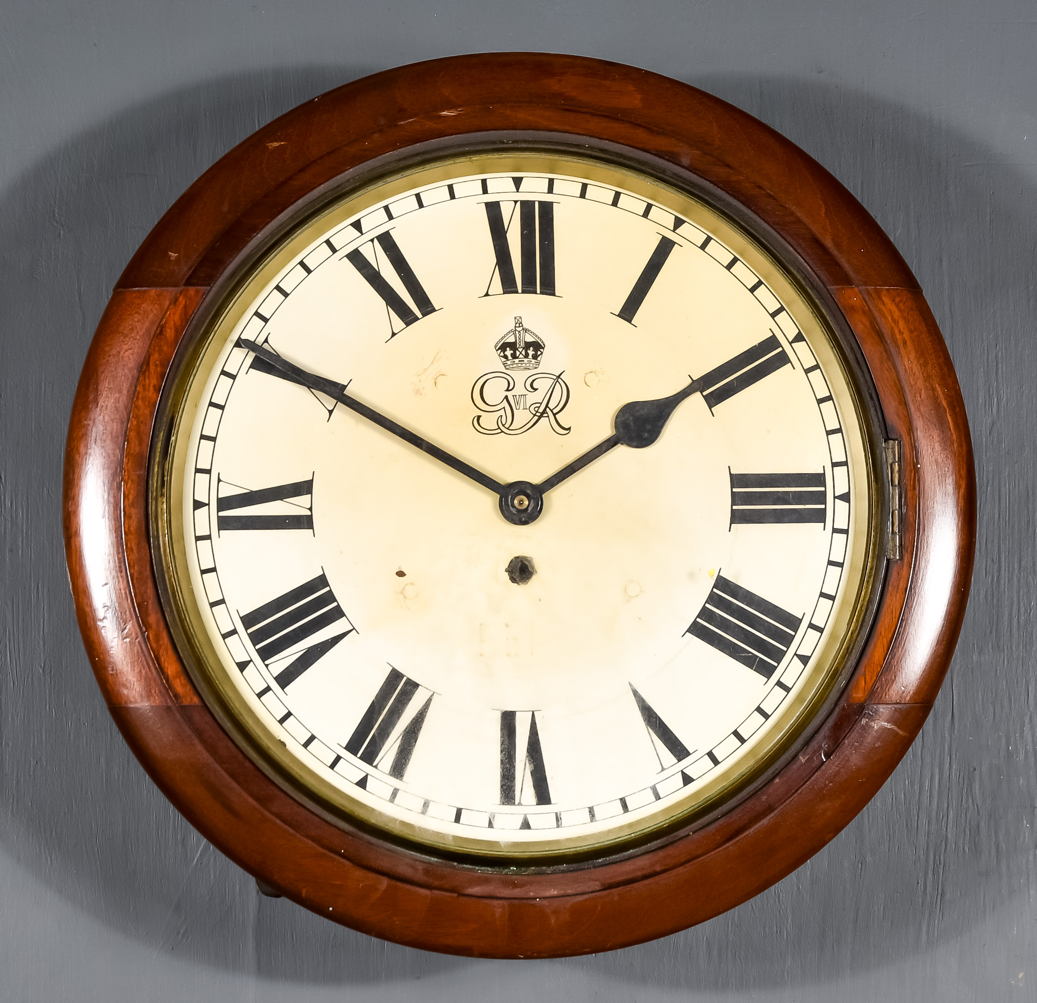 A George VI Mahogany Cased Dial Wall Clock the12ins cream painted dial with Roman numerals, to the