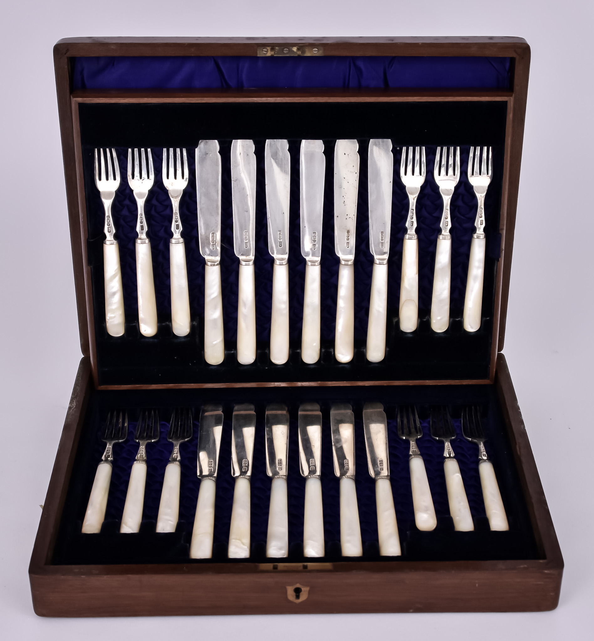 A Set of Twelve Late Victorian Silver Bladed and Mother-Of-Pearl Handled Fish Knives and Forks, by