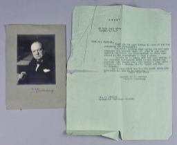 A Portrait Photograph of Winston Churchill by Walter Stoneman, signed by Churchill, "WS