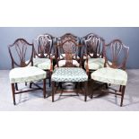 A Harlequin Set of Nine Late 18th Century Dining Chairs, of "Hepplewhite" design, the shaped back