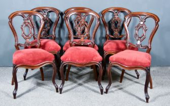 A Set of Six 19th Century Mahogany Dining Chairs, each with moulded curved crest rails, carved and