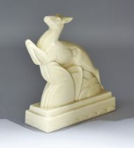 A Carter, Stabler and Adams Poole Pottery Model of a Leaping Deer, with cream glaze, impressed mark,