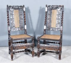 A Pair of Oak Dining Chairs of 17th Century Design, the crests carved with crowns, the backs and