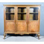 A Late Victorian Walnut Dwarf Display Cabinet, with moulded edge to top, fitted three shelves