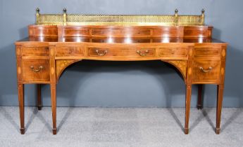 An Edwardian Mahogany and Inlaid Sideboard, of serpentine outline, by Morrison of Edinburgh, with