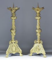 A Pair of Gilt Metal Ecclesiastical Candlesticks of Medieval Design, 19th Century, the prickets