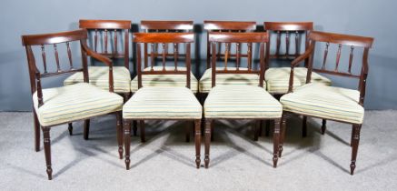 A Set of Eight George III Mahogany Dining Chairs, including two armchairs, with plain crest rails,