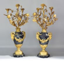 A Pair of Continental Green-Veined Marble and Ormolu Five-Branch Candelabra, 19th/20th Century, of