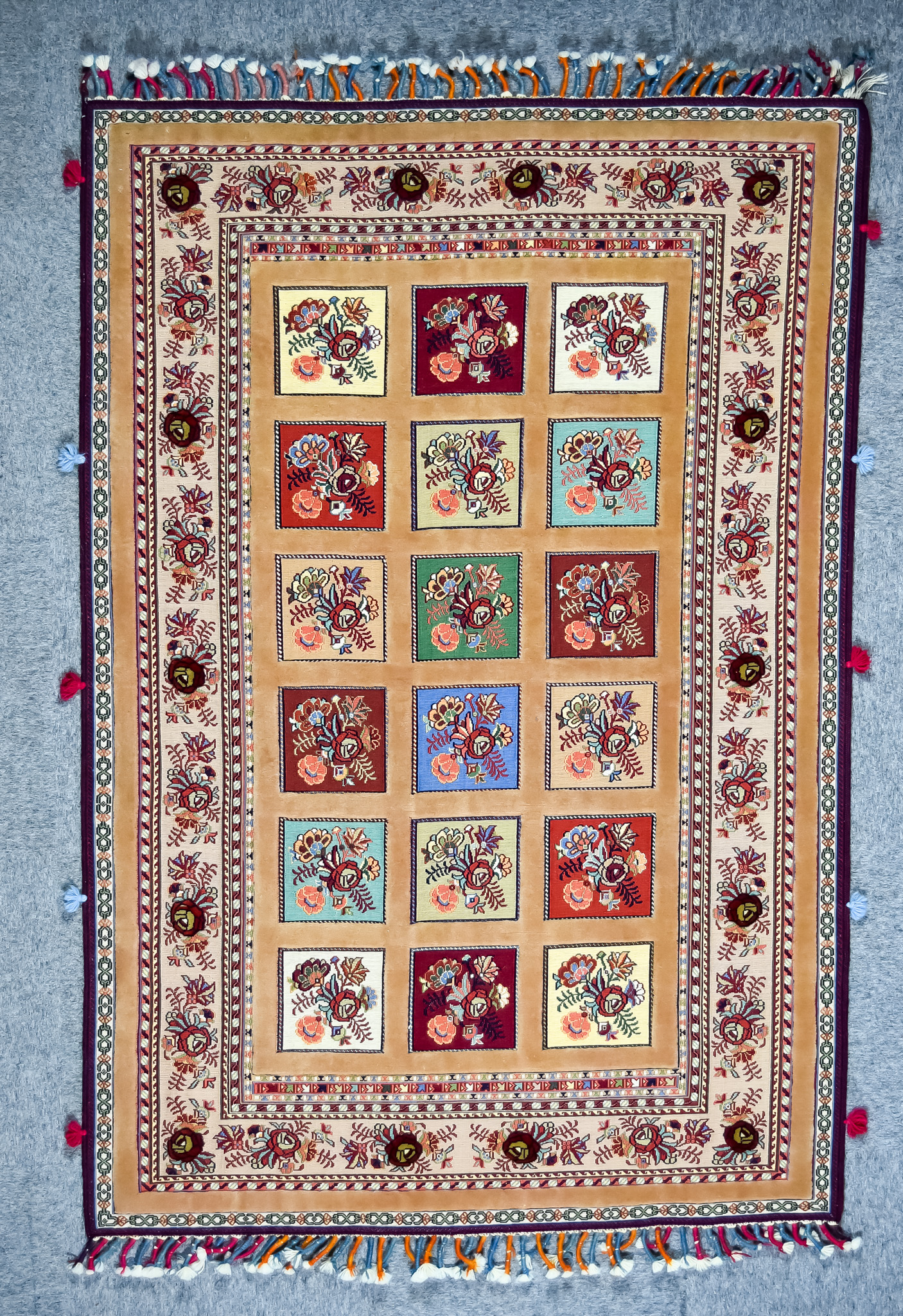 A 20th Century Kerman (Sirjan-Afshar) Rug, woven in colours of fawn, wine, green and blue, the field