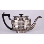 A George III Silver Oval Teapot, by Solomon Hougham, London 1805, with raised rim, moulded band to