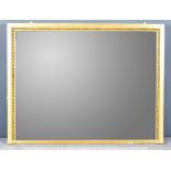 A 19th Century Gilt Framed Rectangular Wall Mirror, with leaf moulded inner frame, inset with