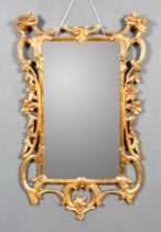 A Modern Gilt Frame Rectangular Wall Mirror of 18th Century "Rococo" Design, with open scroll frame,