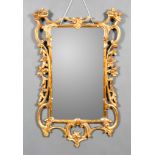 A Modern Gilt Frame Rectangular Wall Mirror of 18th Century "Rococo" Design, with open scroll frame,